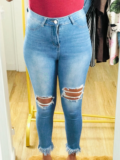 High-waisted ripped skinny jeans